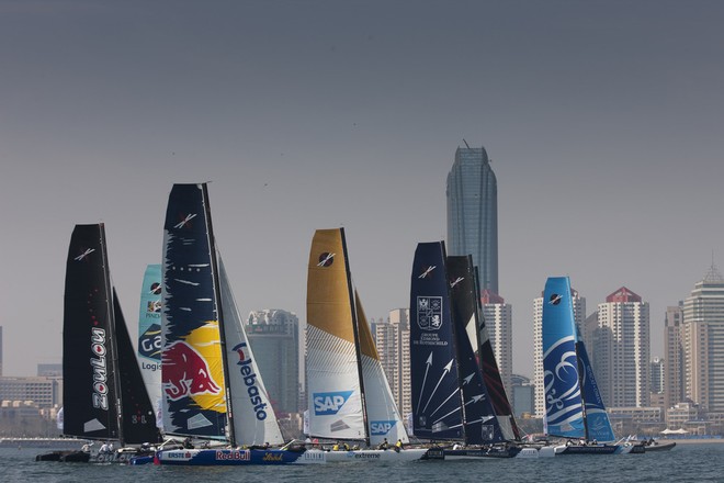 The Extreme 40 fleet racing in front of the impressive skyline in Fushan Bay, Qingdao - Act 2, Day 1, Extreme Sailing Series 2012 &copy; Lloyd Images http://lloydimagesgallery.photoshelter.com/